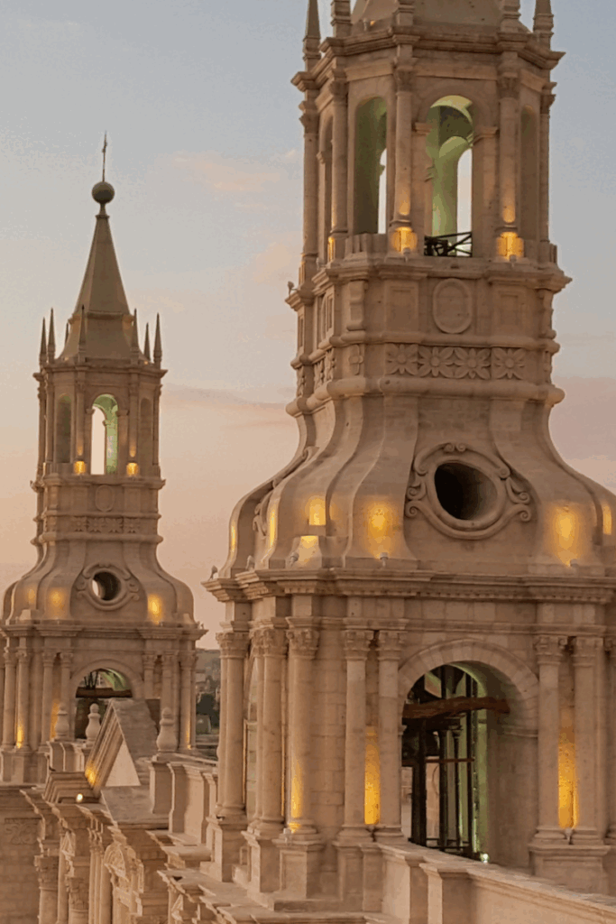 Sunset lights the towers of Arequipa Cathedral